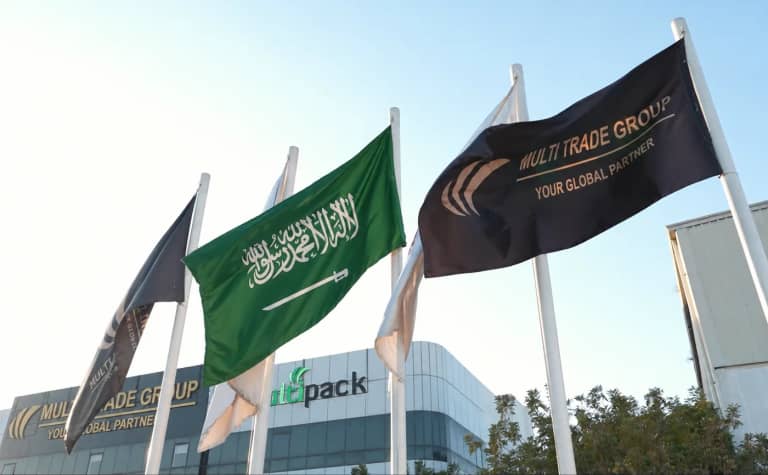 Illustrative Saudi Arabia flag with Multi Trade Group branding