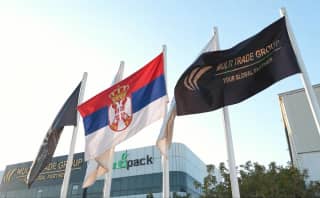 Illustrative Serbia flag with Multi Trade Group branding
