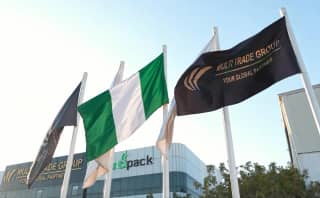 Illustrative Nigeria flag with Multi Trade Group branding