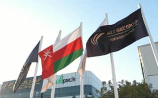 Illustrative Oman flag with Multi Trade Group branding